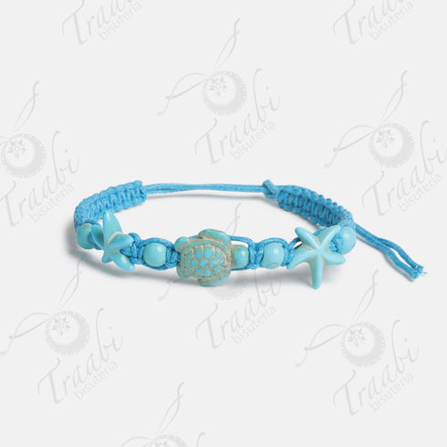 Pulsera estrella y tortuga tejida de hilo turquesa