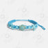 Pulsera estrella y tortuga tejida de hilo turquesa