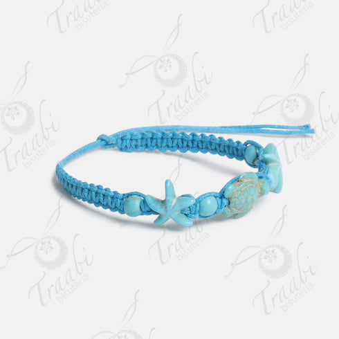 Pulsera estrella y tortuga tejida de hilo turquesa