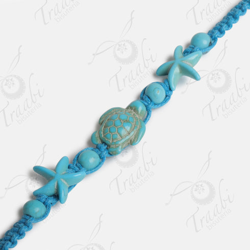 Pulsera estrella y tortuga tejida de hilo turquesa