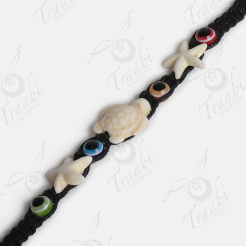 Pulsera estrella, tortuga y ojo tejida de hilo negra