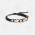 Pulsera estrella tejida de hilo negro